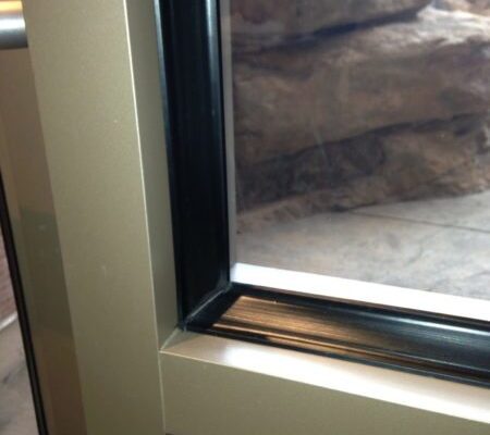 Campbell specializes in precision attachment security wet-glazing as seen here. 800-580-9997